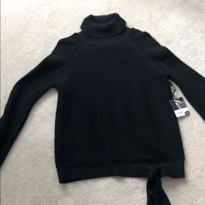 Black Vera Wang turtleneck sweater
